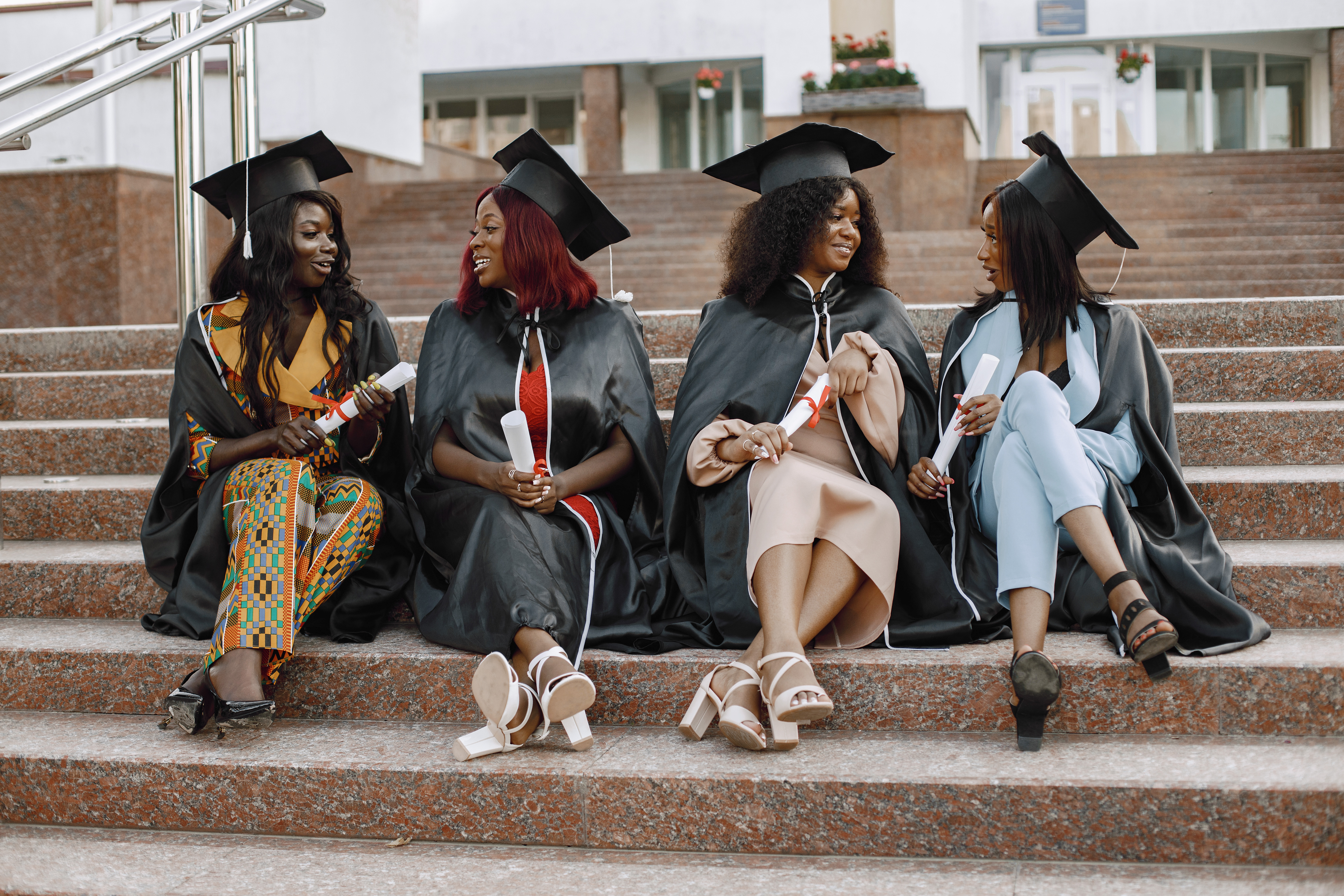 Graduating students sitting together